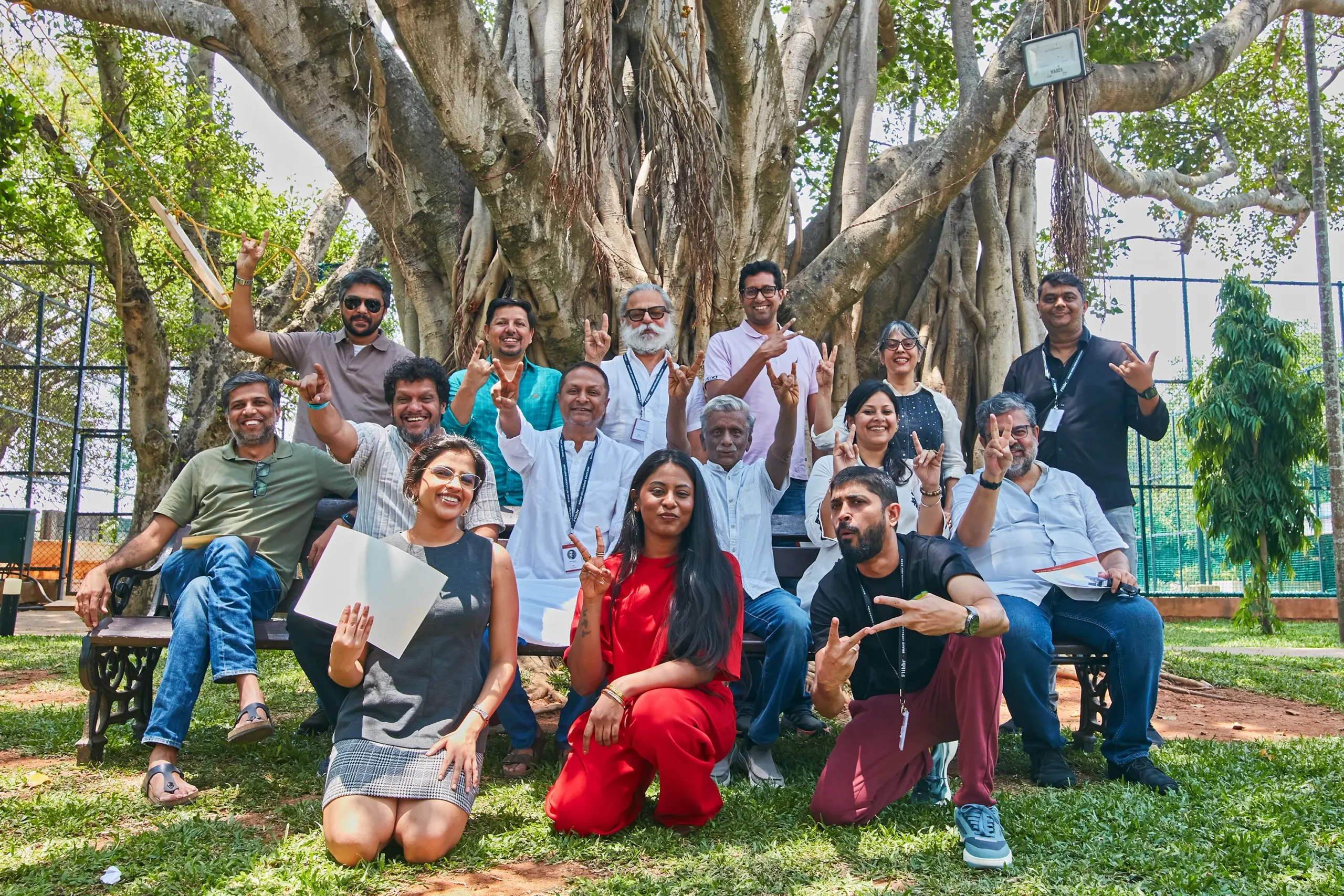 Closing-day attendee group photograph on the Signature Club Resort lawn. Brand Intelligence Bootcamp, Bengaluru, April 2026. Flibbr® Consulting.